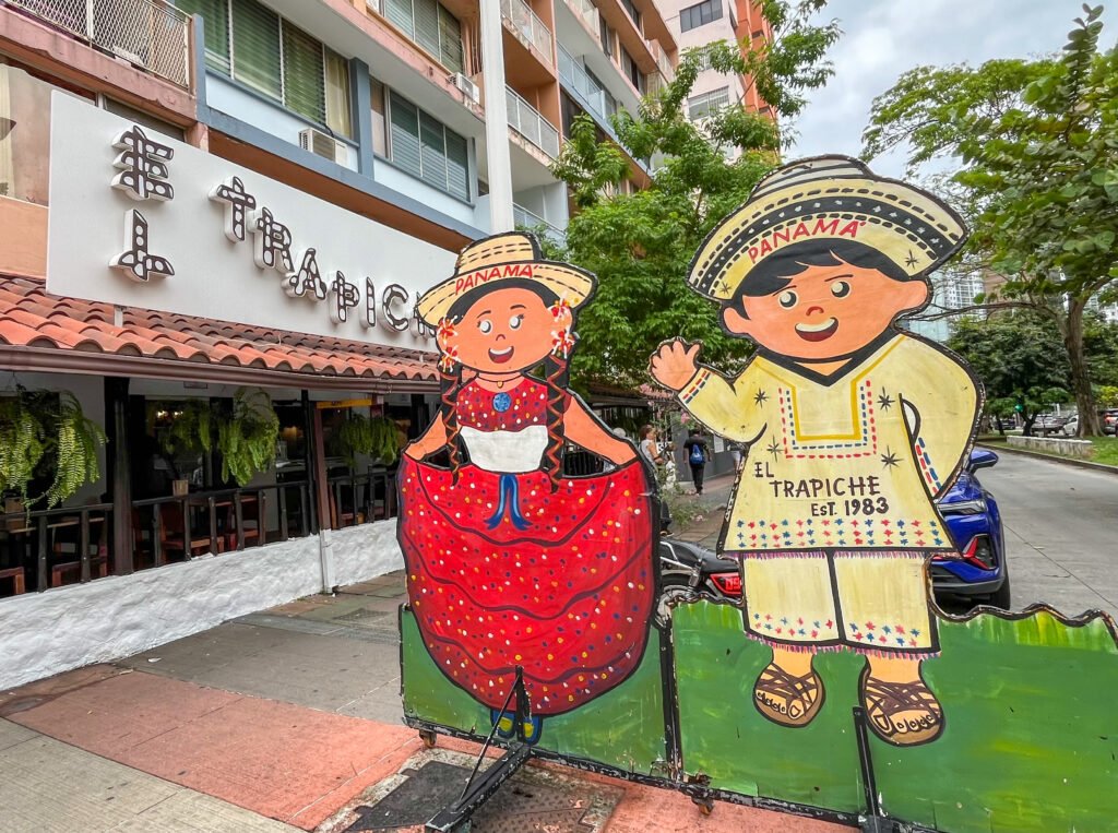 Panamanians posing outside of Panama City's most emblematic source of authentic Panamanian food, El Trapiche.