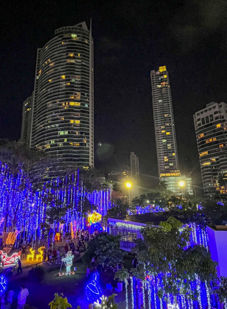 Christmas lights of Parque Urraca against the Panama City skyline