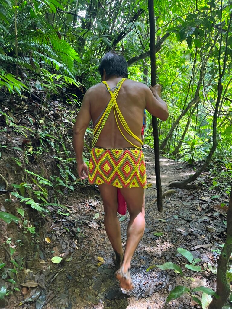 Emberá man walking into the jungle of Panama. THE EMBERA OF PANAMA TRULY A WORLD AWAY
